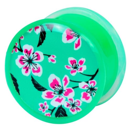 Grüner Plug mit rosa Blumenmuster auf weißem Hintergrund