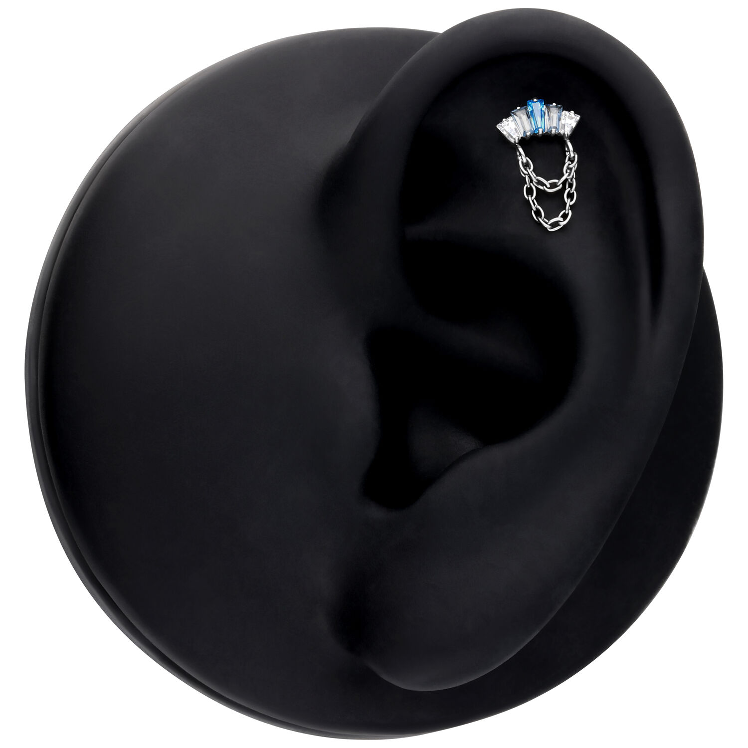 Silberner Push Fit Aufsatz mit Lavendel- und Türkiskristallen auf schwarzem Ohrdisplay