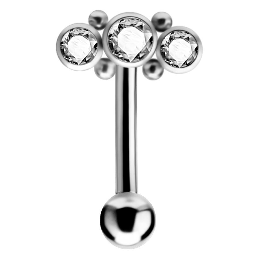 Titan Augenbrauenpiercing mit Kristallen Silbernes Micro Bananabell mit drei klaren Kristallen auf weißem Hintergrund